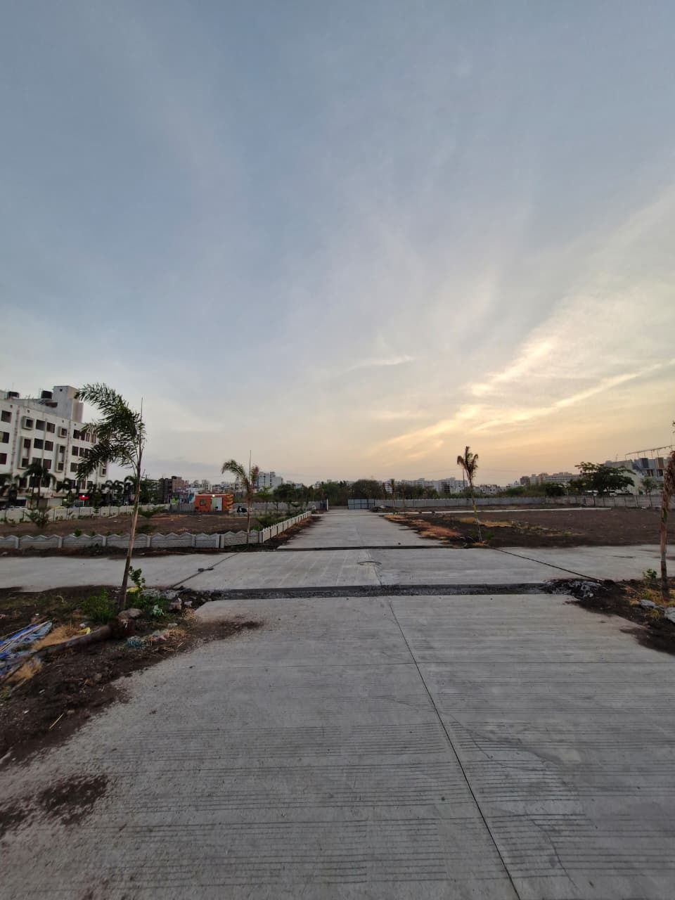 Babji Green City internal road at dusk